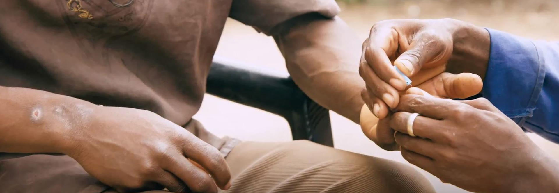 Male taking a malaria test